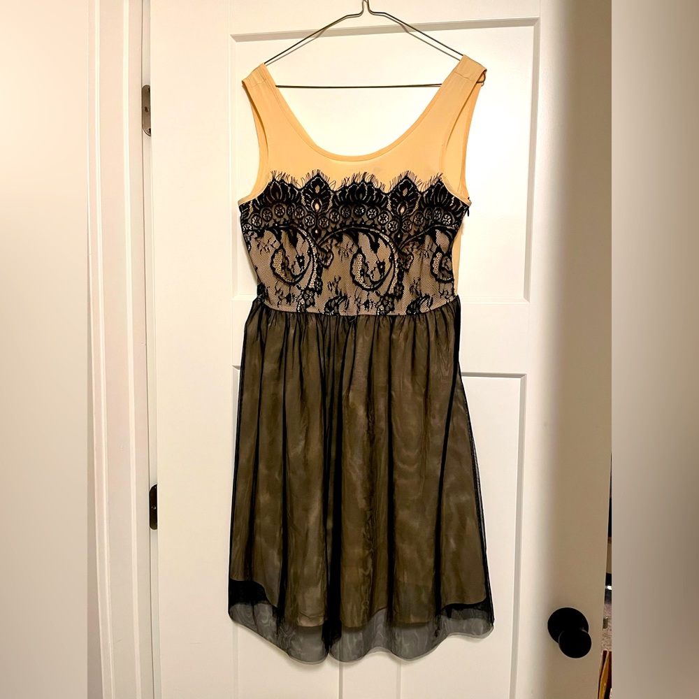 Sheer, black sleeveless cocktail dress